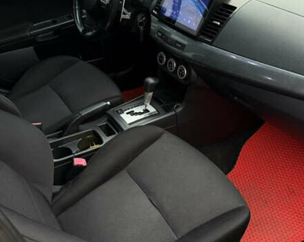 Красный Мицубиси Лансер, объемом двигателя 2 л и пробегом 261 тыс. км за 7200 $, фото 16 на Automoto.ua