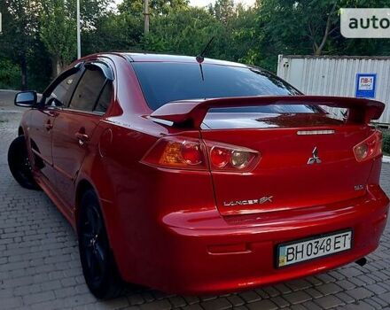 Червоний Міцубісі Lancer, об'ємом двигуна 2 л та пробігом 101 тис. км за 6999 $, фото 11 на Automoto.ua