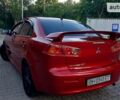 Червоний Міцубісі Lancer, об'ємом двигуна 2 л та пробігом 101 тис. км за 6999 $, фото 11 на Automoto.ua