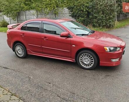 Червоний Міцубісі Lancer, об'ємом двигуна 2 л та пробігом 186 тис. км за 5600 $, фото 4 на Automoto.ua
