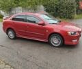 Червоний Міцубісі Lancer, об'ємом двигуна 2 л та пробігом 186 тис. км за 5600 $, фото 4 на Automoto.ua
