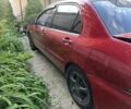 Червоний Міцубісі Lancer, об'ємом двигуна 1.6 л та пробігом 200 тис. км за 1700 $, фото 1 на Automoto.ua