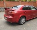 Червоний Міцубісі Lancer, об'ємом двигуна 2 л та пробігом 187 тис. км за 5500 $, фото 9 на Automoto.ua