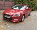 Міцубісі Lancer 2007 у Києві на Automoto.ua Червоний Міцубісі Lancer, об'ємом двигуна 2 л та пробігом 186 тис. км за 5600 $, фото 7 на Automoto.ua