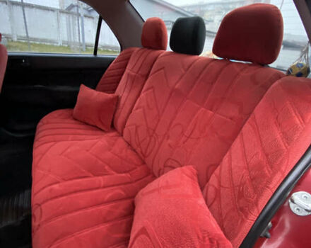 Червоний Міцубісі Lancer, об'ємом двигуна 1.58 л та пробігом 151 тис. км за 5600 $, фото 11 на Automoto.ua