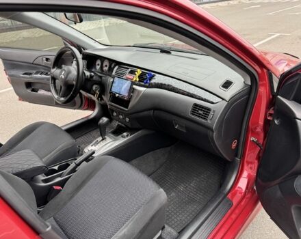 Красный Мицубиси Лансер, объемом двигателя 1.6 л и пробегом 285 тыс. км за 3650 $, фото 13 на Automoto.ua