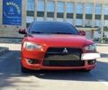 Красный Мицубиси Лансер, объемом двигателя 2 л и пробегом 275 тыс. км за 6500 $, фото 1 на Automoto.ua