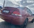 Красный Мицубиси Лансер, объемом двигателя 1.6 л и пробегом 242 тыс. км за 4999 $, фото 26 на Automoto.ua