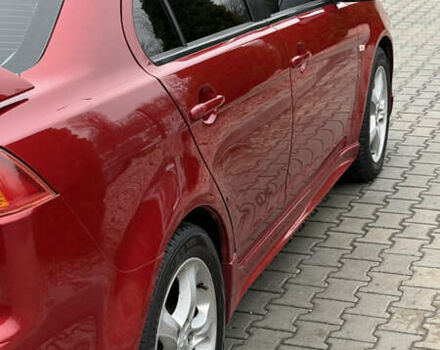 Красный Мицубиси Лансер, объемом двигателя 2 л и пробегом 261 тыс. км за 7200 $, фото 4 на Automoto.ua