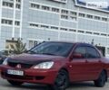 Красный Мицубиси Лансер, объемом двигателя 1.6 л и пробегом 242 тыс. км за 4999 $, фото 18 на Automoto.ua