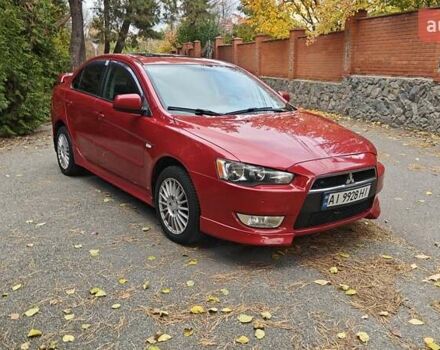 Червоний Міцубісі Lancer, об'ємом двигуна 2 л та пробігом 187 тис. км за 5500 $, фото 4 на Automoto.ua