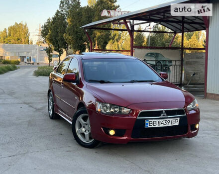 Червоний Міцубісі Lancer, об'ємом двигуна 2 л та пробігом 250 тис. км за 6500 $, фото 5 на Automoto.ua