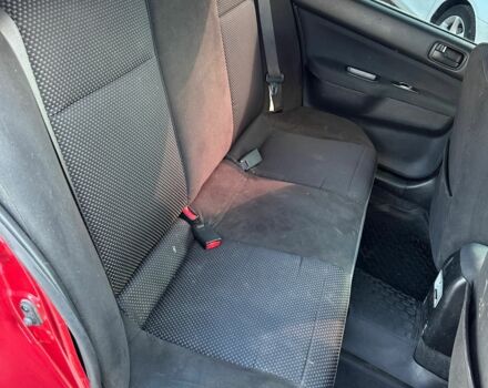 Красный Мицубиси Лансер, объемом двигателя 1.6 л и пробегом 230 тыс. км за 5300 $, фото 5 на Automoto.ua