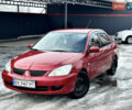 Червоний Міцубісі Lancer, об'ємом двигуна 1.6 л та пробігом 312 тис. км за 3400 $, фото 1 на Automoto.ua