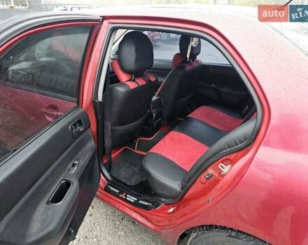 Червоний Міцубісі Lancer, об'ємом двигуна 1.6 л та пробігом 267 тис. км за 2999 $, фото 9 на Automoto.ua