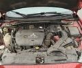 Червоний Міцубісі Lancer, об'ємом двигуна 2 л та пробігом 186 тис. км за 5600 $, фото 26 на Automoto.ua