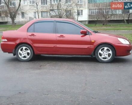 Красный Мицубиси Лансер, объемом двигателя 1.6 л и пробегом 250 тыс. км за 3700 $, фото 3 на Automoto.ua