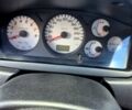 Красный Мицубиси Лансер, объемом двигателя 1.6 л и пробегом 272 тыс. км за 3700 $, фото 5 на Automoto.ua