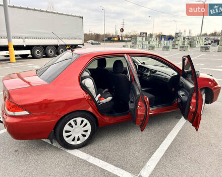 Червоний Міцубісі Lancer, об'ємом двигуна 1.6 л та пробігом 194 тис. км за 5500 $, фото 7 на Automoto.ua