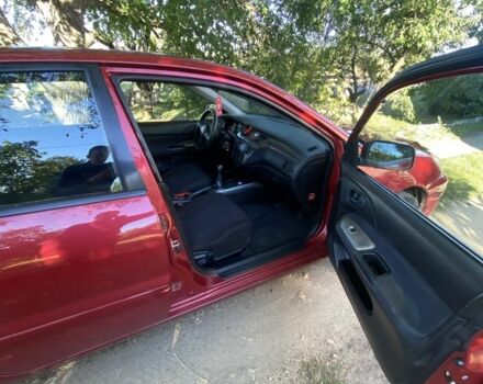 Красный Мицубиси Лансер, объемом двигателя 1.6 л и пробегом 277 тыс. км за 3299 $, фото 5 на Automoto.ua