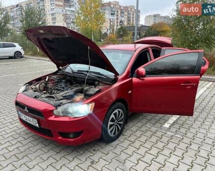 Красный Мицубиси Лансер, объемом двигателя 1.5 л и пробегом 207 тыс. км за 4500 $, фото 7 на Automoto.ua