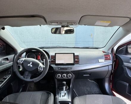 Красный Мицубиси Лансер, объемом двигателя 2 л и пробегом 267 тыс. км за 7000 $, фото 20 на Automoto.ua