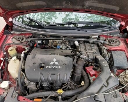 Червоний Міцубісі Lancer, об'ємом двигуна 2 л та пробігом 259 тис. км за 6500 $, фото 5 на Automoto.ua