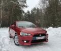 Червоний Міцубісі Lancer, об'ємом двигуна 2 л та пробігом 203 тис. км за 7500 $, фото 1 на Automoto.ua
