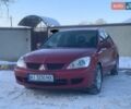 Червоний Міцубісі Lancer, об'ємом двигуна 1.58 л та пробігом 220 тис. км за 3650 $, фото 1 на Automoto.ua