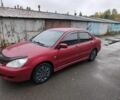 Червоний Міцубісі Lancer, об'ємом двигуна 1.6 л та пробігом 187 тис. км за 4554 $, фото 1 на Automoto.ua