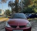 Червоний Міцубісі Lancer, об'ємом двигуна 1.6 л та пробігом 133 тис. км за 1800 $, фото 1 на Automoto.ua