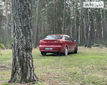 Червоний Міцубісі Lancer, об'ємом двигуна 1.5 л та пробігом 214 тис. км за 6150 $, фото 31 на Automoto.ua