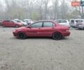 Червоний Міцубісі Lancer, об'ємом двигуна 1.6 л та пробігом 267 тис. км за 2999 $, фото 6 на Automoto.ua