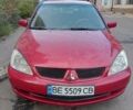 Червоний Міцубісі Lancer, об'ємом двигуна 1.6 л та пробігом 350 тис. км за 4650 $, фото 1 на Automoto.ua