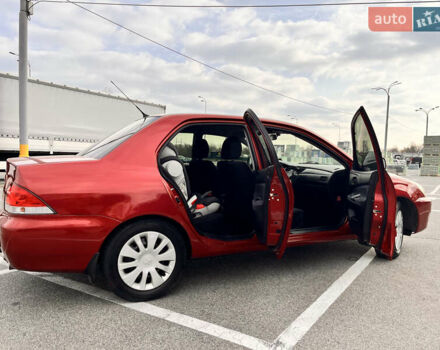 Червоний Міцубісі Lancer, об'ємом двигуна 1.6 л та пробігом 194 тис. км за 5500 $, фото 8 на Automoto.ua