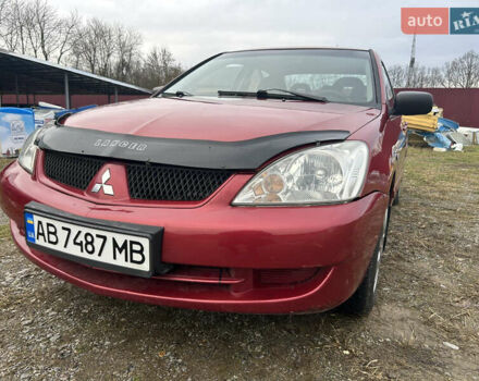 Красный Мицубиси Лансер, объемом двигателя 1.58 л и пробегом 280 тыс. км за 3250 $, фото 2 на Automoto.ua