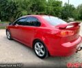 Червоний Міцубісі Lancer, об'ємом двигуна 2 л та пробігом 259 тис. км за 6500 $, фото 2 на Automoto.ua
