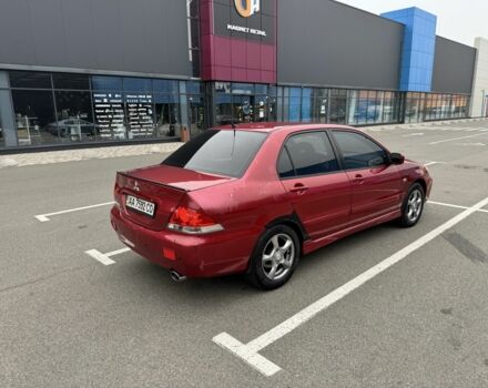 Красный Мицубиси Лансер, объемом двигателя 1.6 л и пробегом 285 тыс. км за 3650 $, фото 6 на Automoto.ua