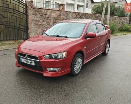 Червоний Міцубісі Lancer, об'ємом двигуна 2 л та пробігом 186 тис. км за 5600 $, фото 3 на Automoto.ua