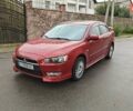 Червоний Міцубісі Lancer, об'ємом двигуна 2 л та пробігом 186 тис. км за 5600 $, фото 3 на Automoto.ua