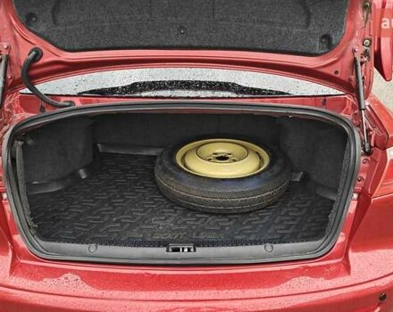 Червоний Міцубісі Lancer, об'ємом двигуна 2 л та пробігом 186 тис. км за 5600 $, фото 25 на Automoto.ua