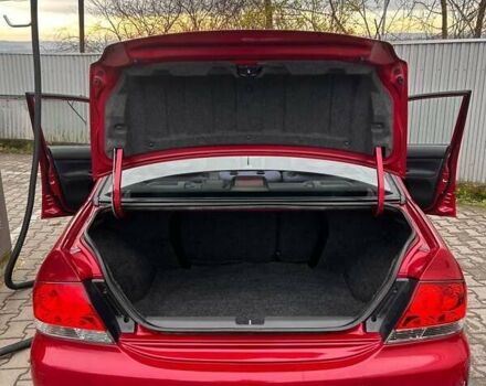 Красный Мицубиси Лансер, объемом двигателя 1.6 л и пробегом 176 тыс. км за 4300 $, фото 24 на Automoto.ua