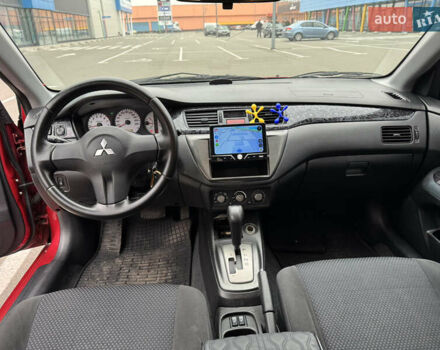 Красный Мицубиси Лансер, объемом двигателя 1.58 л и пробегом 285 тыс. км за 3650 $, фото 10 на Automoto.ua