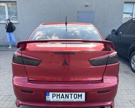 Червоний Міцубісі Lancer, об'ємом двигуна 2 л та пробігом 254 тис. км за 7500 $, фото 4 на Automoto.ua