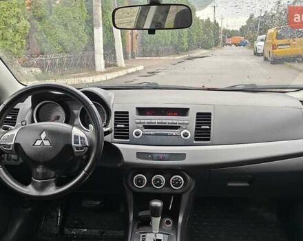 Червоний Міцубісі Lancer, об'ємом двигуна 2 л та пробігом 186 тис. км за 5600 $, фото 22 на Automoto.ua