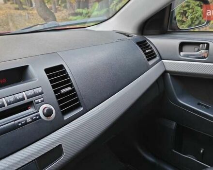 Червоний Міцубісі Lancer, об'ємом двигуна 2 л та пробігом 187 тис. км за 5500 $, фото 19 на Automoto.ua