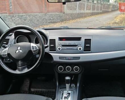 Міцубісі Lancer 2007 у Києві на Automoto.ua Червоний Міцубісі Lancer, об'ємом двигуна 2 л та пробігом 186 тис. км за 5600 $, фото 28 на Automoto.ua