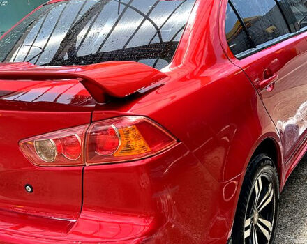 Красный Мицубиси Лансер, объемом двигателя 1.5 л и пробегом 145 тыс. км за 6500 $, фото 3 на Automoto.ua