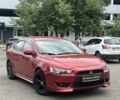 Червоний Міцубісі Lancer, об'ємом двигуна 2 л та пробігом 184 тис. км за 5999 $, фото 1 на Automoto.ua