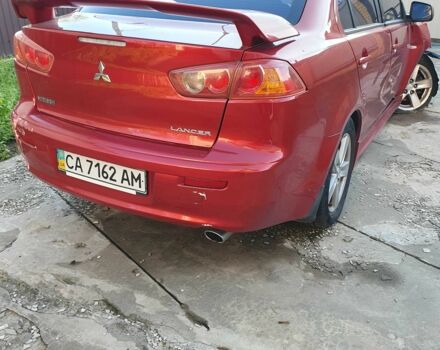 Красный Мицубиси Лансер, объемом двигателя 2 л и пробегом 406 тыс. км за 2750 $, фото 5 на Automoto.ua